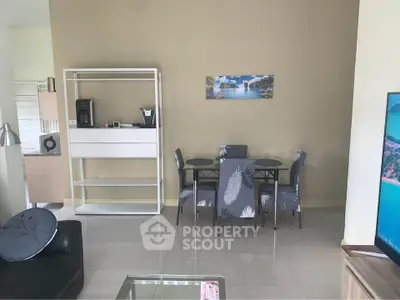 Modern living room with dining area and sleek furniture