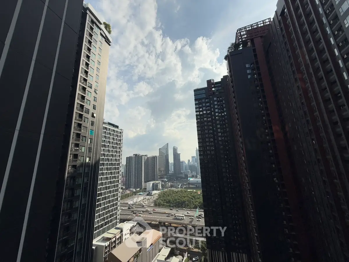 Stunning urban skyline view from high-rise building showcasing cityscape and modern architecture.