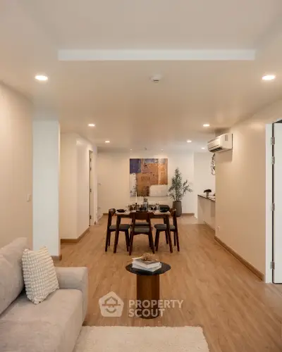 Spacious modern living room with elegant dining area and stylish decor