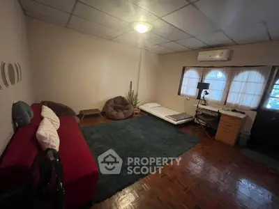 Spacious living room with cozy seating and natural light