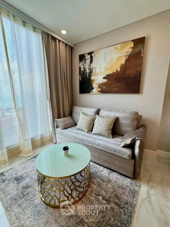 Elegant living room with modern sofa and artistic wall painting