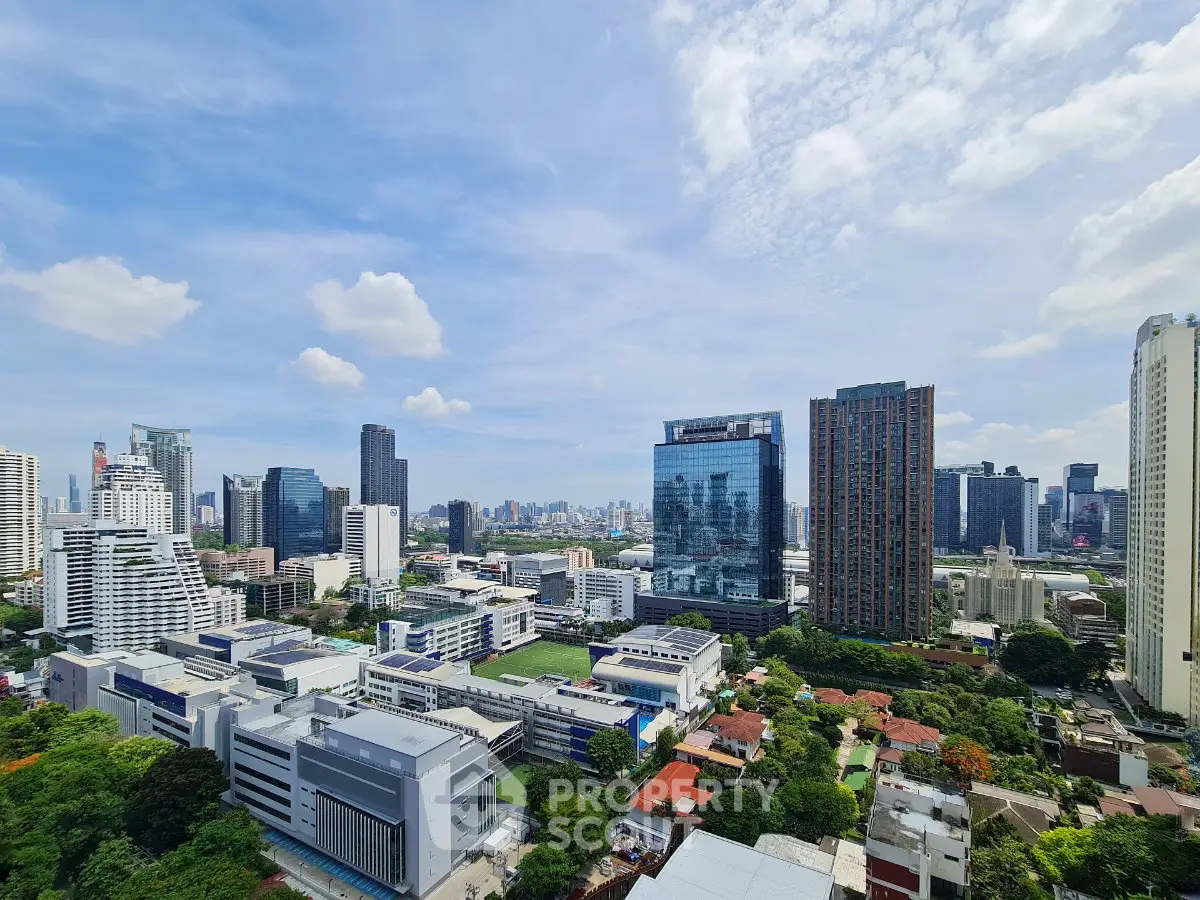 Stunning cityscape view showcasing modern skyscrapers and lush greenery, perfect for urban living enthusiasts.