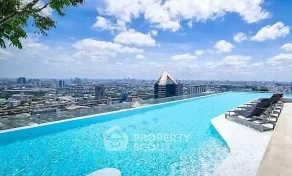 Stunning rooftop infinity pool with panoramic city skyline views