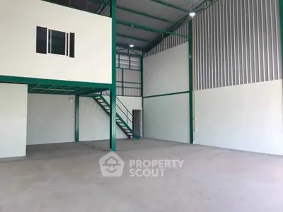 Spacious industrial warehouse with mezzanine and high ceilings