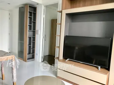 Modern living room with sleek TV unit and stylish shelving