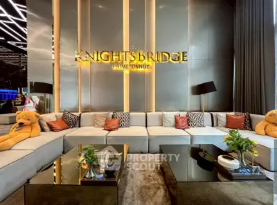 Luxurious modern living room with plush seating and stylish decor at Knightsbridge Prime Onnut.