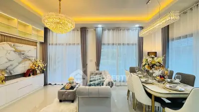 Luxurious living room with elegant chandeliers and modern decor