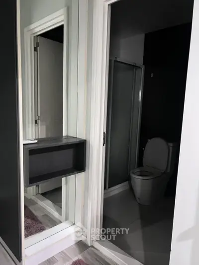 Modern bathroom with sleek design and glass shower enclosure