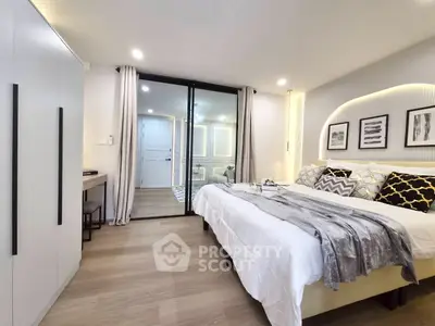 Luxurious modern bedroom with stylish decor and cozy ambiance
