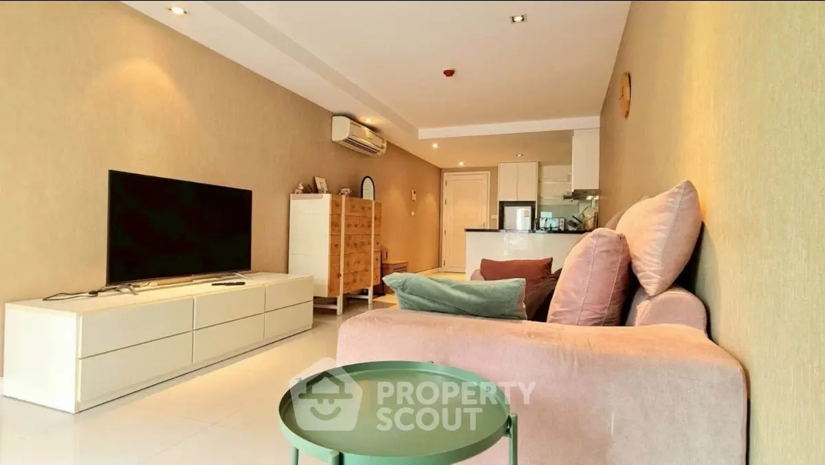 Spacious living room with modern decor and cozy seating area