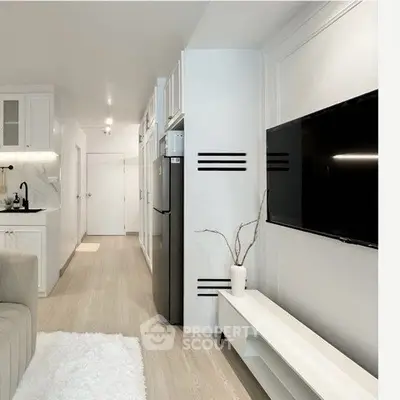 Modern minimalist living room with sleek kitchen and wall-mounted TV