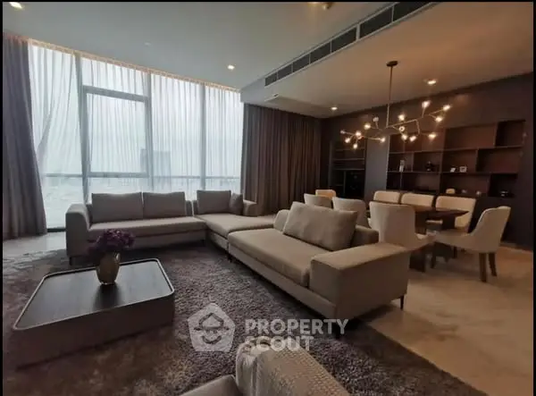 Luxurious living room with modern furniture and elegant lighting