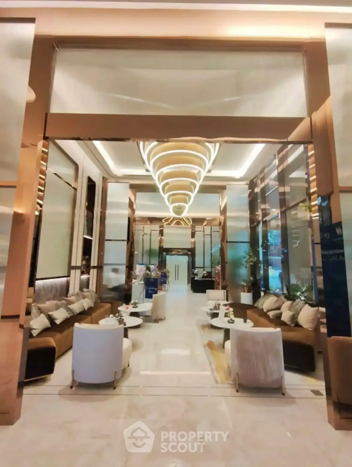 Luxurious modern lobby with elegant seating and stunning lighting fixtures