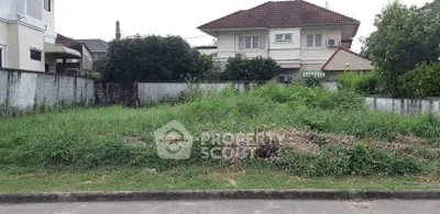 Vacant land plot in residential area with potential for development.