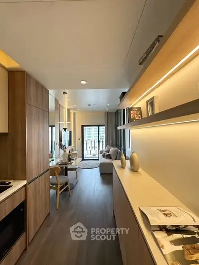Modern open-plan living room with stylish decor and natural light