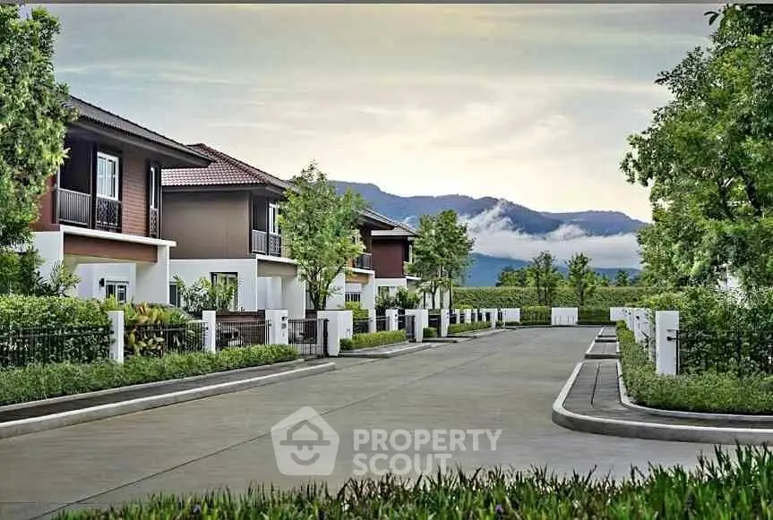 Charming suburban homes with scenic mountain backdrop and lush greenery.