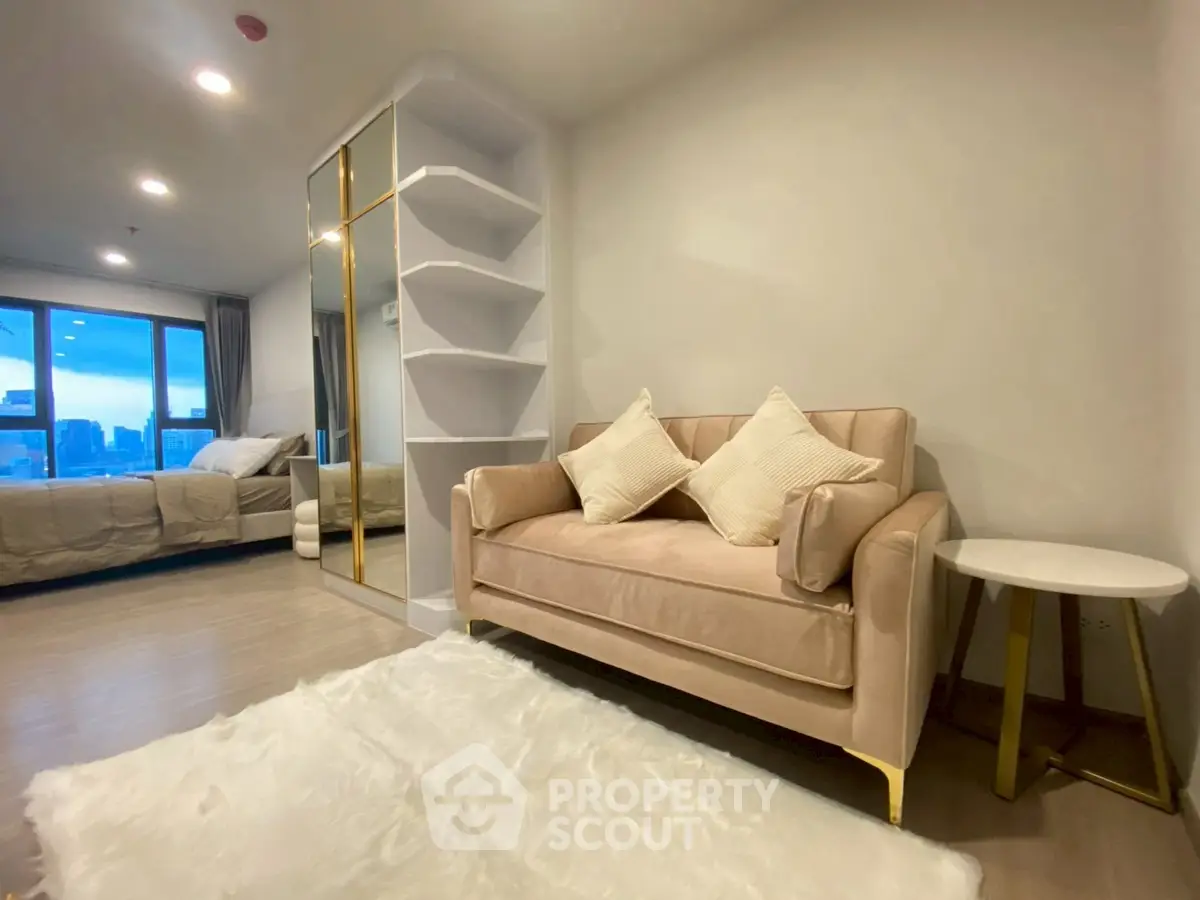 Modern living room with plush sofa and city view in luxury apartment