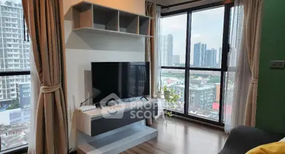 Modern living room with large windows offering stunning city views