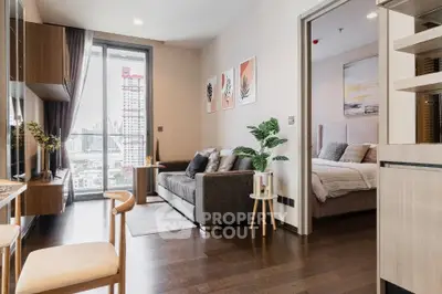 Modern apartment interior with cozy living room and stylish bedroom, featuring elegant decor and city view.