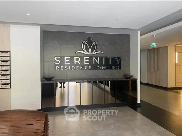 Modern lobby entrance of Serenity Residence Jomtien with sleek design and elegant decor.