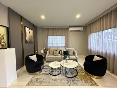 Elegant modern living room with stylish furniture and decor
