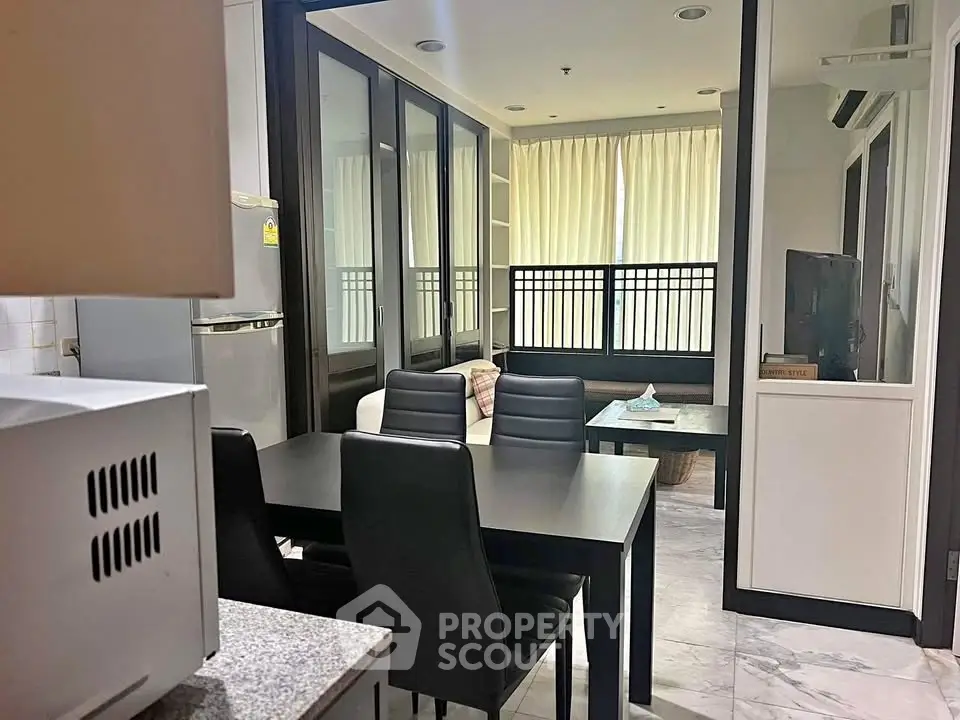 Modern apartment interior with sleek dining area and cozy living room