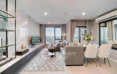 Luxurious modern living room with stunning city view and elegant decor