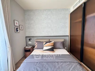 Cozy modern bedroom with stylish decor and natural light