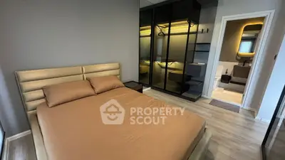 Modern bedroom with sleek design and spacious wardrobe