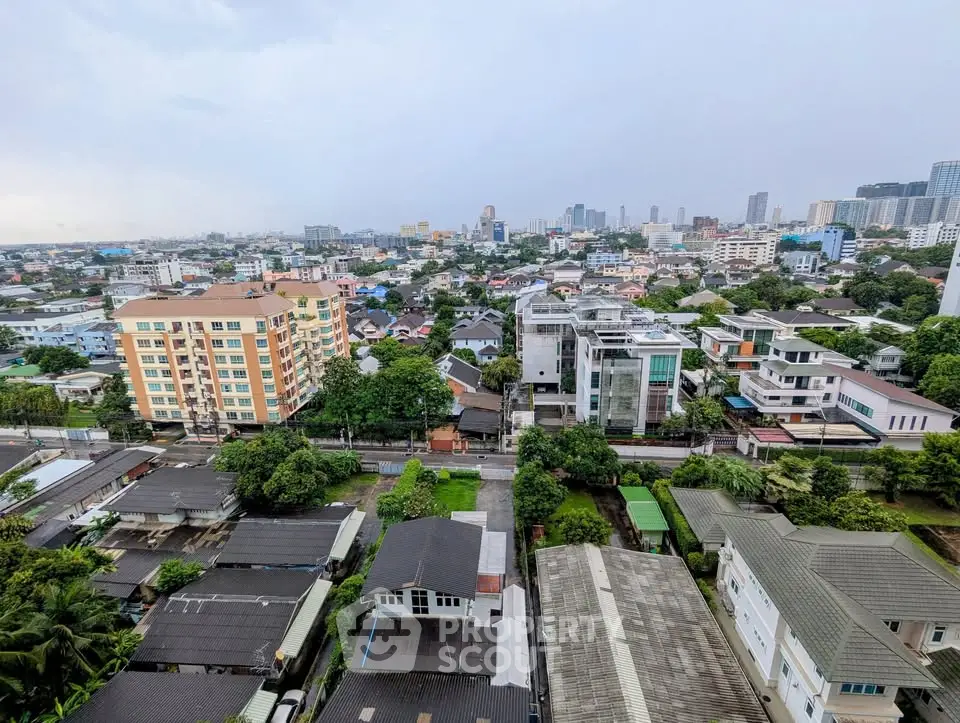 Stunning cityscape view from high-rise building showcasing urban living and skyline.