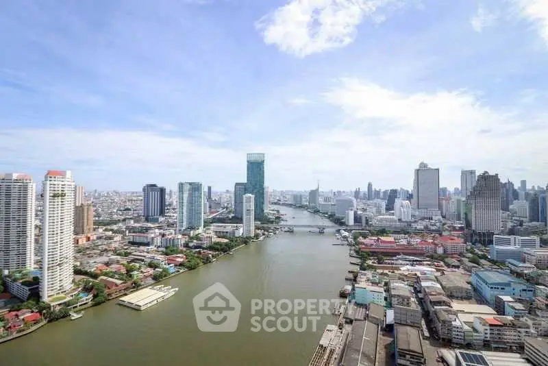 Stunning cityscape view of river and skyline from high-rise building