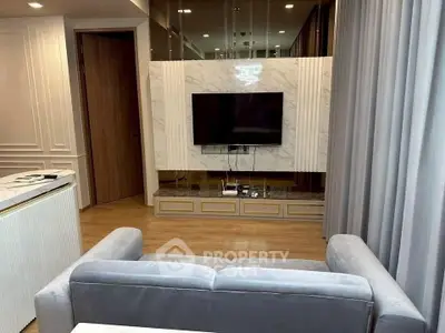 Modern living room with sleek TV setup and elegant decor