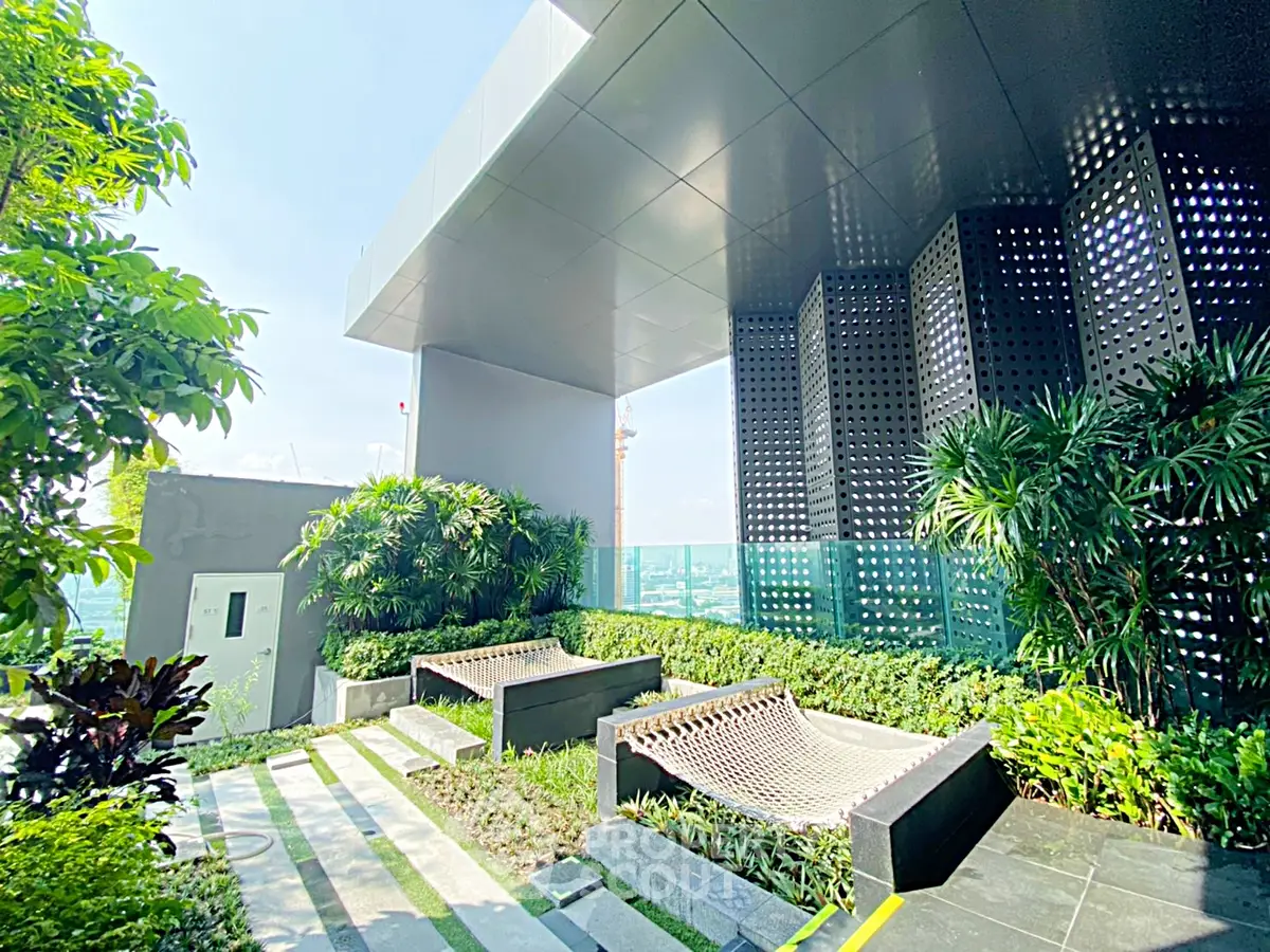 Luxurious rooftop garden with modern design and stunning city views, perfect for relaxation and leisure.