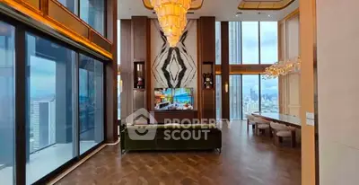 Luxurious high-rise living room with floor-to-ceiling windows and stunning city views.