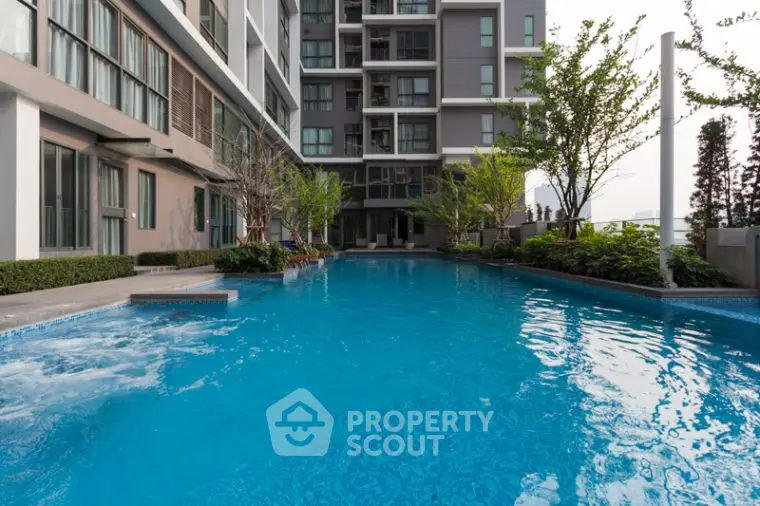 Luxurious condominium with stunning pool and modern architecture