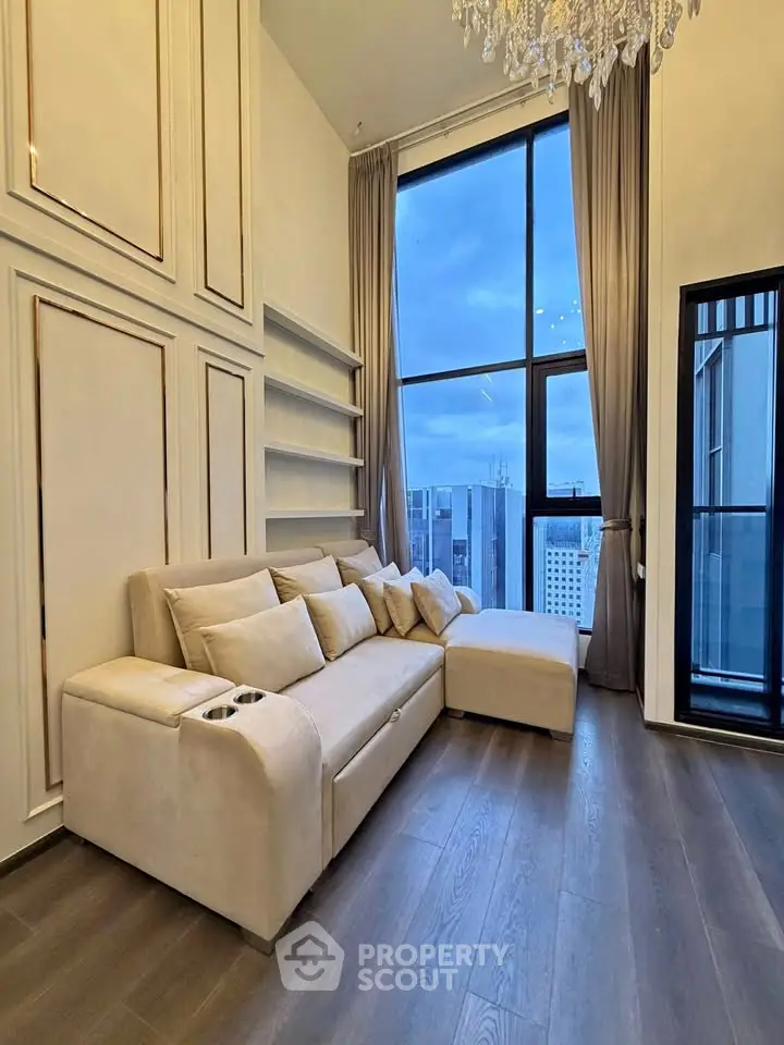 Luxurious living room with high ceilings and stunning city view