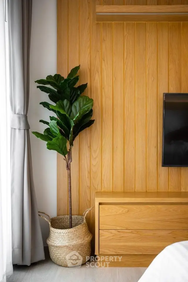 Modern living room with wooden paneling and stylish decor