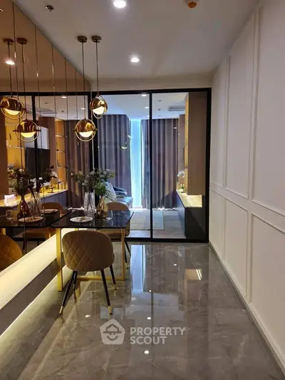 Luxurious modern dining area with elegant lighting and sleek design