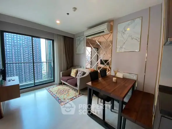 Modern living room with balcony view in high-rise apartment