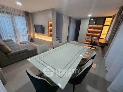 Modern living room with sleek furniture and ambient lighting