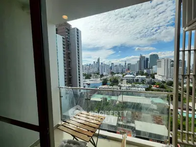 Stunning city view from a modern balcony in a high-rise apartment