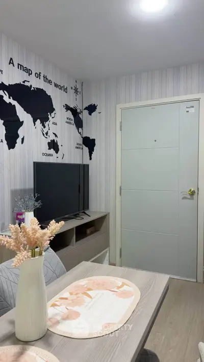 Cozy living room with world map wall art and modern TV setup