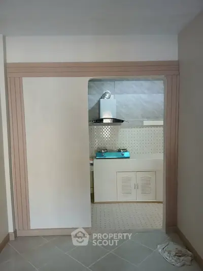 Modern kitchen with sleek design and gas stove in a cozy apartment