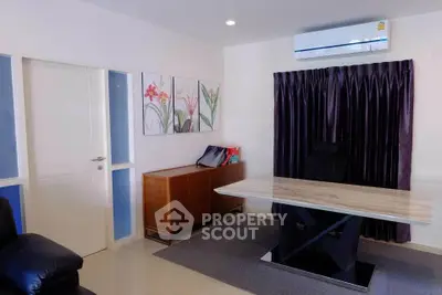 Modern study room with sleek desk and air conditioning