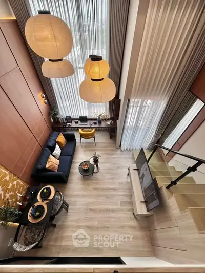 Stunning modern living room with high ceilings and elegant decor