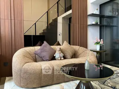 Stylish modern living room with plush sofa and elegant decor