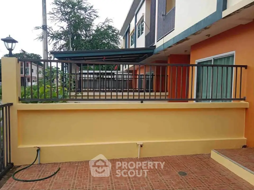 Charming townhouse with spacious balcony and modern exterior design