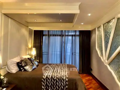 Luxurious bedroom with elegant decor and ambient lighting
