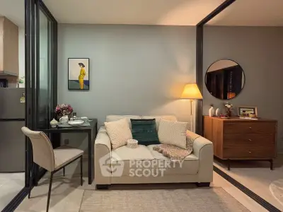 Cozy living room with modern decor and soft lighting, perfect for relaxation and entertaining guests.