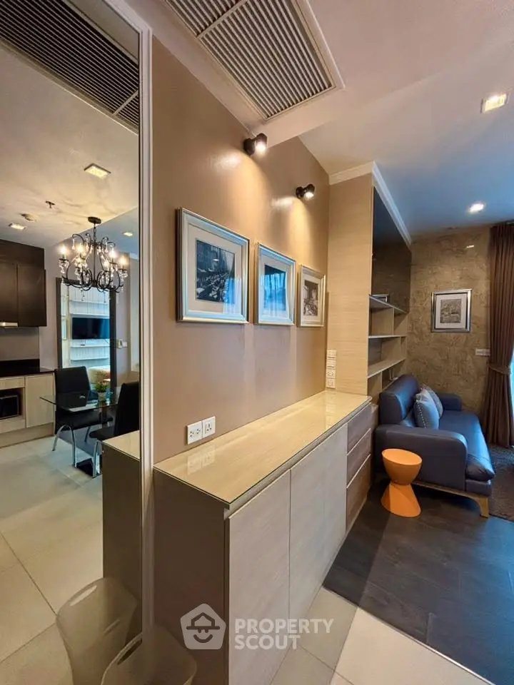 Modern living room with stylish decor and open kitchen layout